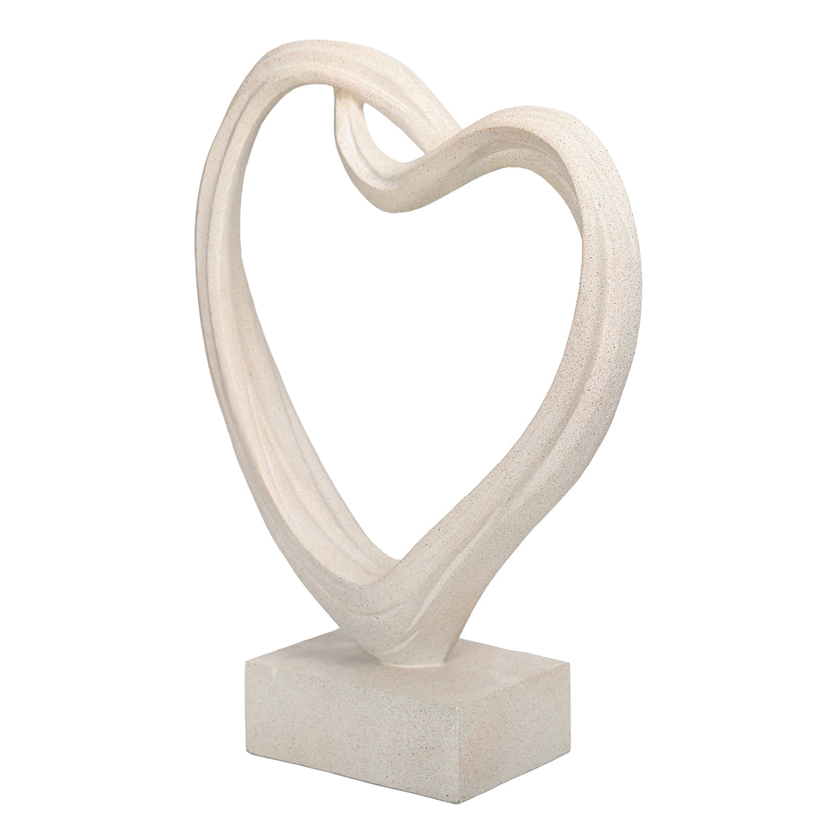 Angled view of the white heart sculpture showing the depth of its curved form and rectangular plinth.
