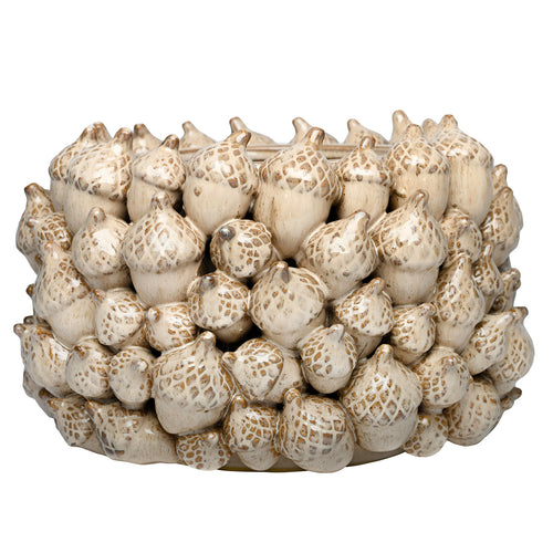 Front view of the cream Acorn Planter, with overlapping acorns of varied sizes covering its rounded body.