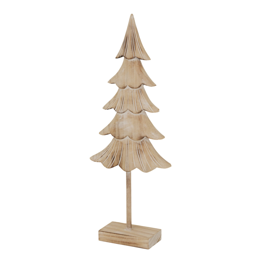 Angled view of the standing fir ornament showing scalloped branches, pale relief lines and the top and side of its rectangular base.