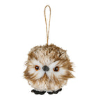 Front view of a rounded cream-and-brown owl hanging decoration with amber-rimmed dark eyes, black beak and feet, and a long loop above its head.
