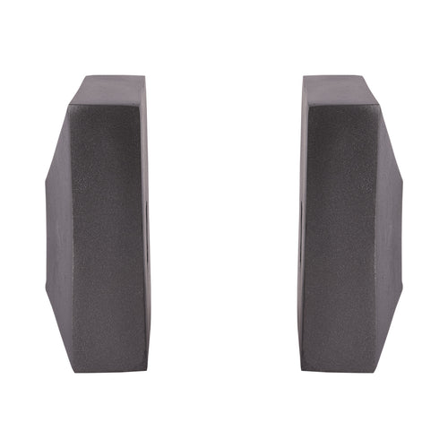 Side view of the two bookends spaced apart, showing their thick rectangular profiles and sloping outer faces.