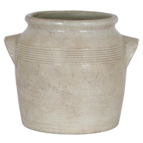 Front view of the pale cream planter with angular handles on both sides and warm-beige mottling across its rounded body.