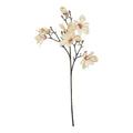 Full view of an artificial flower stem with a long bare dark brown base, branching cream and pale apricot blooms, blush accents and tan buds.