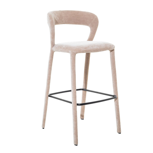 Opposite front angle of the taupe bar stool, showing the rounded seat front and tapered fabric-covered legs.