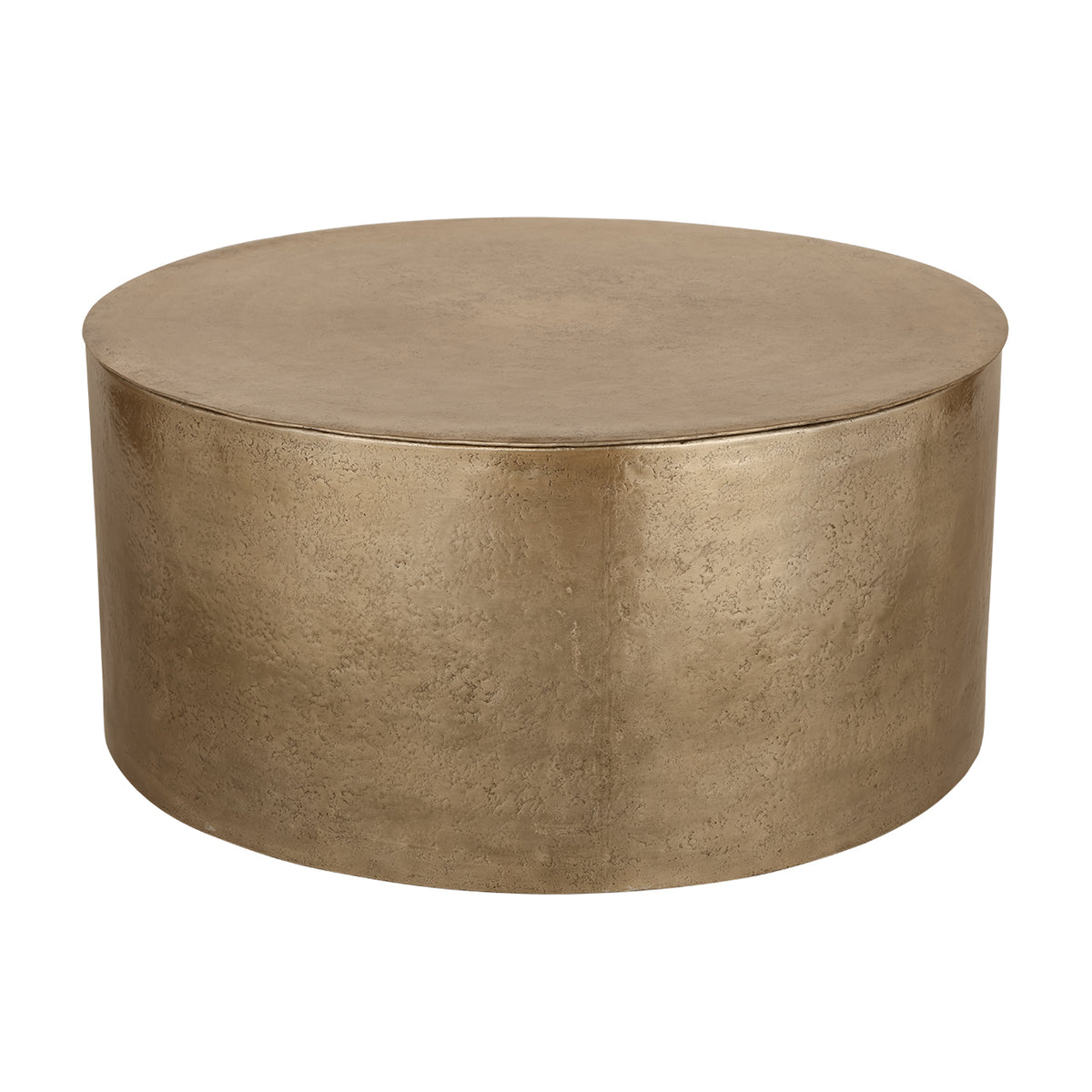 Arcade champagne-gold drum coffee table viewed at an angle, showing the round top and textured curved body.