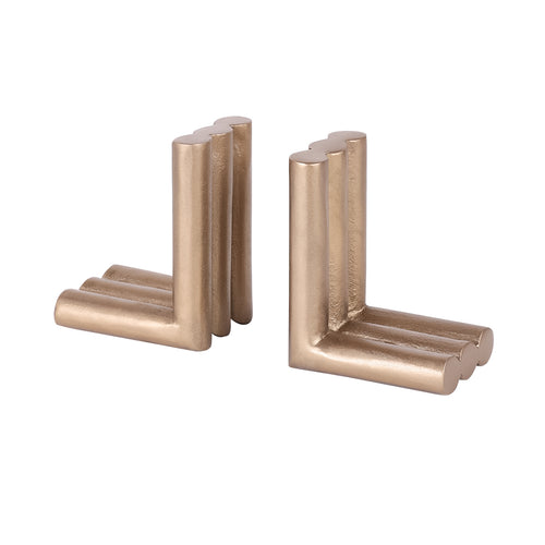 Pair of antique brass finish bookends viewed at an angle, showing three rounded columns along each L-shaped profile.