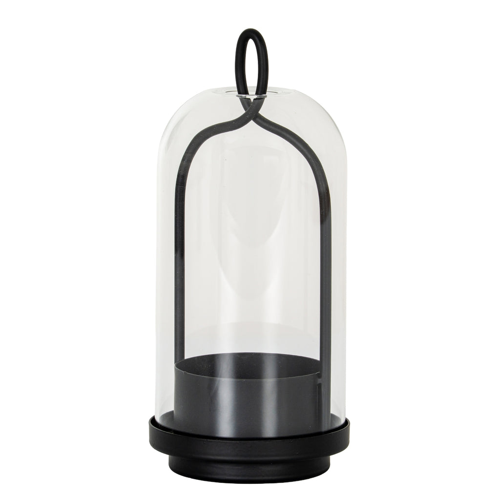 Archloop candle holder with a clear bell-shaped cloche, black arched frame, oval top loop and deep candle cup on a stepped round base.