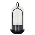Archloop candle holder with a clear bell-shaped cloche, black arched frame, oval top loop and deep candle cup on a stepped round base.