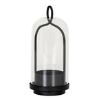 Archloop candle holder with a clear bell-shaped cloche, black arched frame, oval top loop and deep candle cup on a stepped round base.
