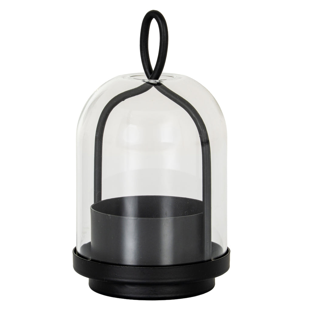 Black candle holder with a deep round cup, stepped base and arched frame beneath a clear bell-shaped cloche, topped by an oval loop.