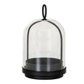 Black candle holder with a stepped round base, deep candle cup and arched frame beneath a clear bell-shaped cloche, topped by an oval loop.