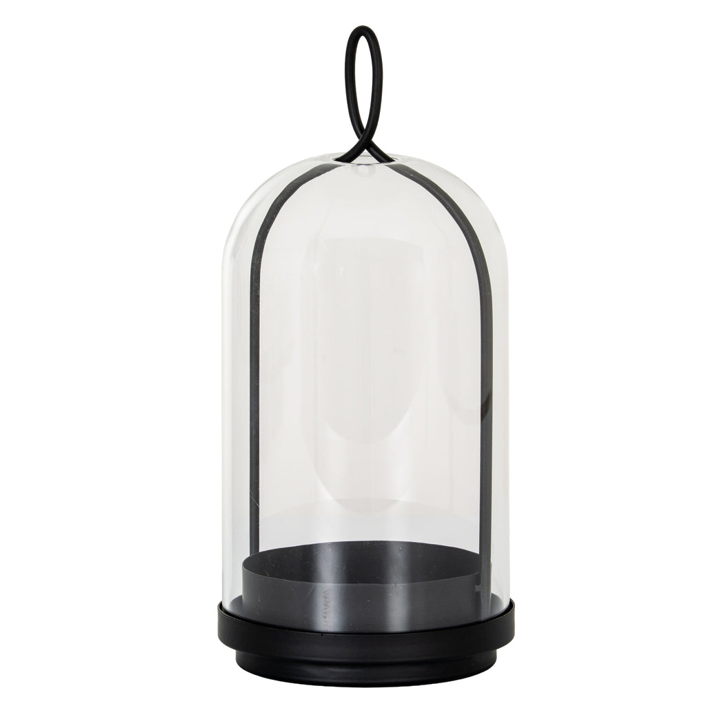 Full view of the black Archloop candle holder with a stepped round base, deep candle cup and arched frame beneath a clear bell-shaped cloche.