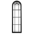Front view of a tall black arched wall mirror with three columns, horizontal crossbars and a smaller inner arch.
