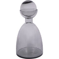 Smoky grey glass bottle vase with its ball top in place, shown upright against a white background.