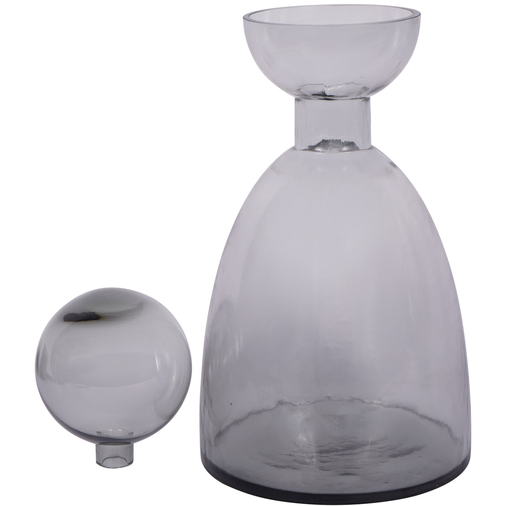 Grey glass bottle vase with its ball removed and placed beside it, revealing the open, bowl-shaped rim.