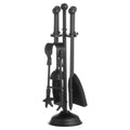 Black fireside companion set on a white background, with ball finials, a wavy rail, tongs at the front and a shovel to the right.