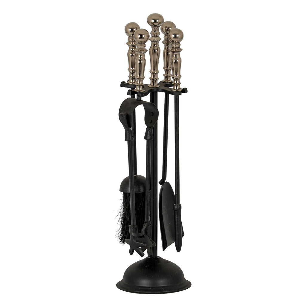 Full view of a black fireplace tool rack with hanging tools, a domed round base and reflective silver-toned ball finials against white.