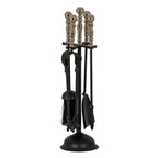 Full view of a black fireplace tool rack with hanging tools, a domed round base and reflective silver-toned ball finials against white.