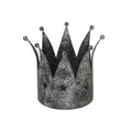 Front view of the antique-silver crown candle holder, showing ball-tipped peaks, star cut-outs and a mottled dark finish.
