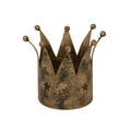 Front view of the antique-gold crown-shaped candle holder, showing dark mottling, ball-tipped peaks and three star cut-outs.