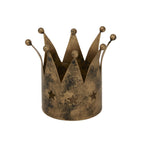 Front view of the antique-gold crown-shaped candle holder, showing dark mottling, ball-tipped peaks and three star cut-outs.