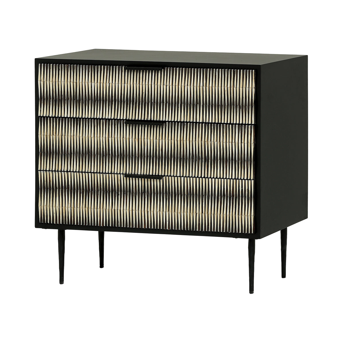 Bastion chest viewed at an angle, showing three patterned black and ivory drawers, a plain black side and slender legs.