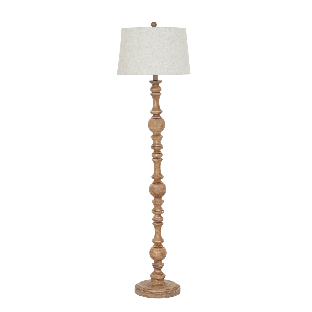 Full view of the Bead & Spindle Floor Lamp with a warm-brown shaped shaft, round base and pale tapered shade.