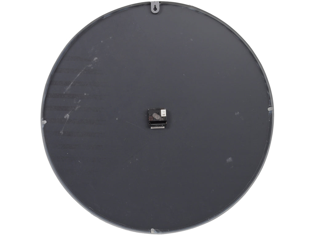 Rear view of the round wall clock, showing a dark backing, central clock mechanism and keyhole hanging tab at the top.