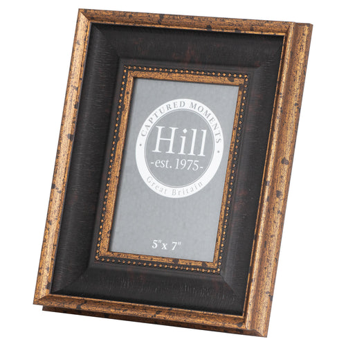 Angled view of the dark recessed photo frame with distressed gold-toned borders, beaded inner trim and a printed display insert.