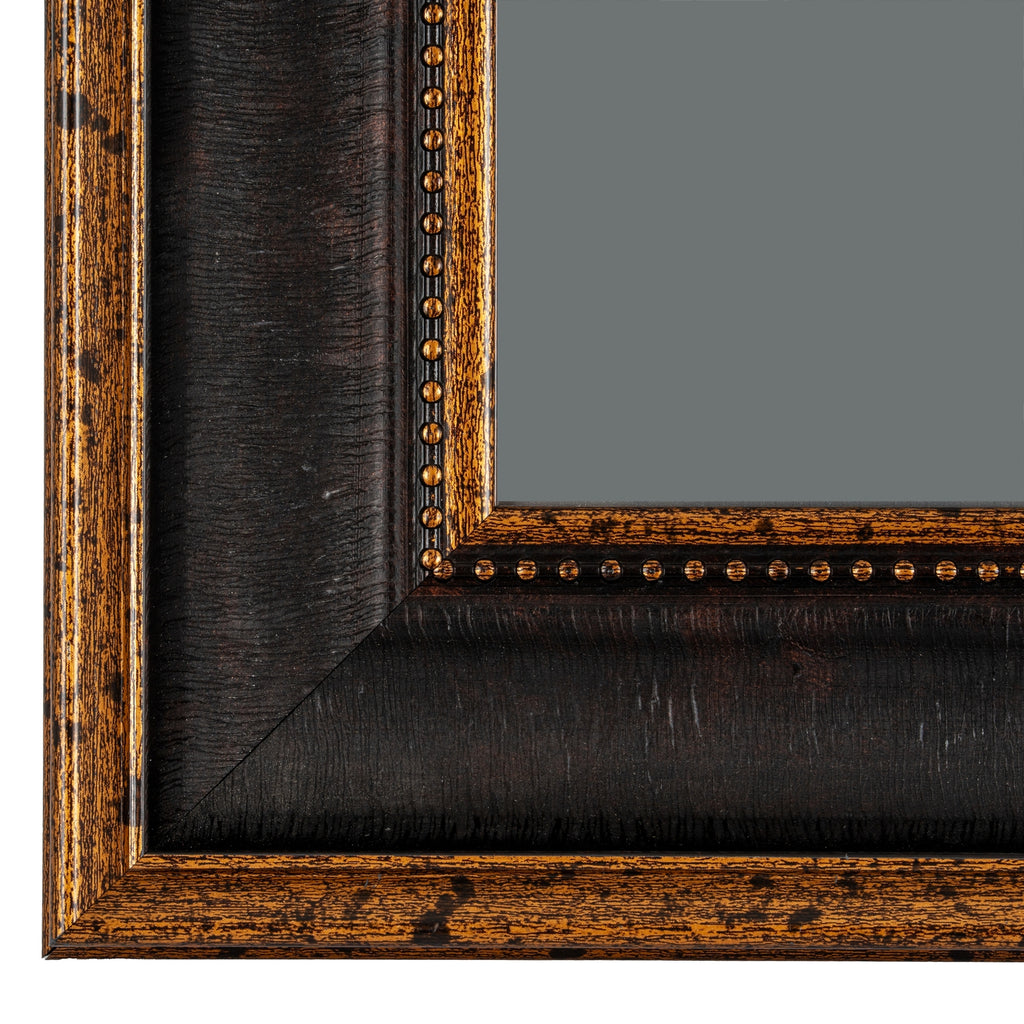 Close-up of the lower frame corner showing small gold-toned beads, the ridged dark recess and distressed markings on the borders.