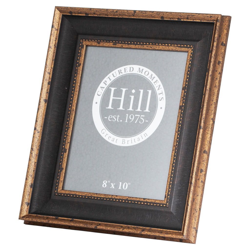 Angled front view of the photo frame with distressed gold-toned borders, a dark recessed surround and a grey printed display insert.