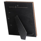 Rear view of the photo frame showing its black backing, turn tabs, two hanging loops and extended easel support.