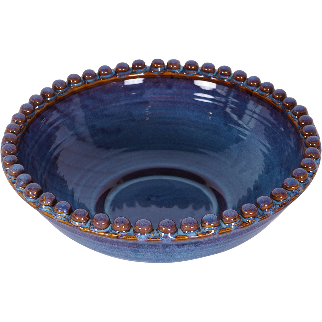 View from above into the glossy blue bowl, with rounded brown and blue beads encircling the interior.