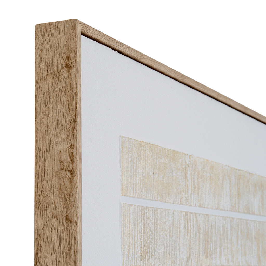 Angled close-up of the artwork's upper corner, showing the grain pattern along the frame's side and the pale border around the beige linework.