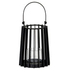 Black candle lantern with a tapered vertical-slat frame, raised rounded handle and clear cylindrical holder above a circular base.