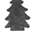 Front detail of the tree ornament's lower branches and broad flat-bottomed trunk, with dense pale speckling over charcoal grey.
