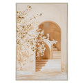 Pale framed portrait artwork showing white blossom branches across cream walls, with warm-brown arches and stairs rising on the right.