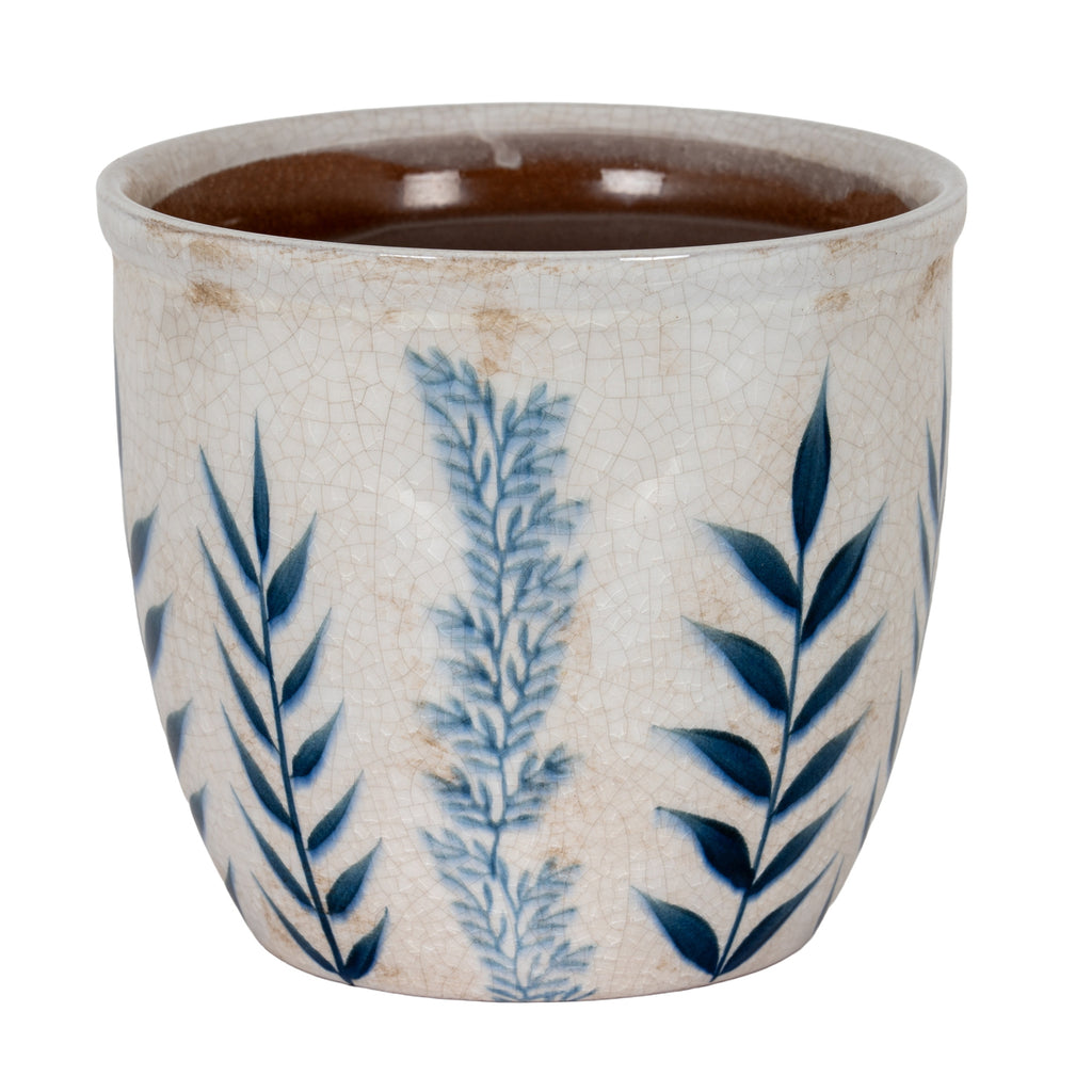 Cylindrical planter with three blue leafy stems on an off-white crackle surface, a rounded rim and a glossy brown interior.