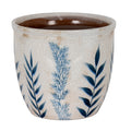 Cylindrical planter with three blue leafy stems on an off-white crackle surface, a rounded rim and a glossy brown interior.
