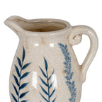 Close view of the vase's open mouth, broad lip and loop handle, showing the curled handle join and cream crackle finish.