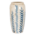Tall tapered vase with upright blue botanical stems on an off-white crackle surface, shown in full against white.