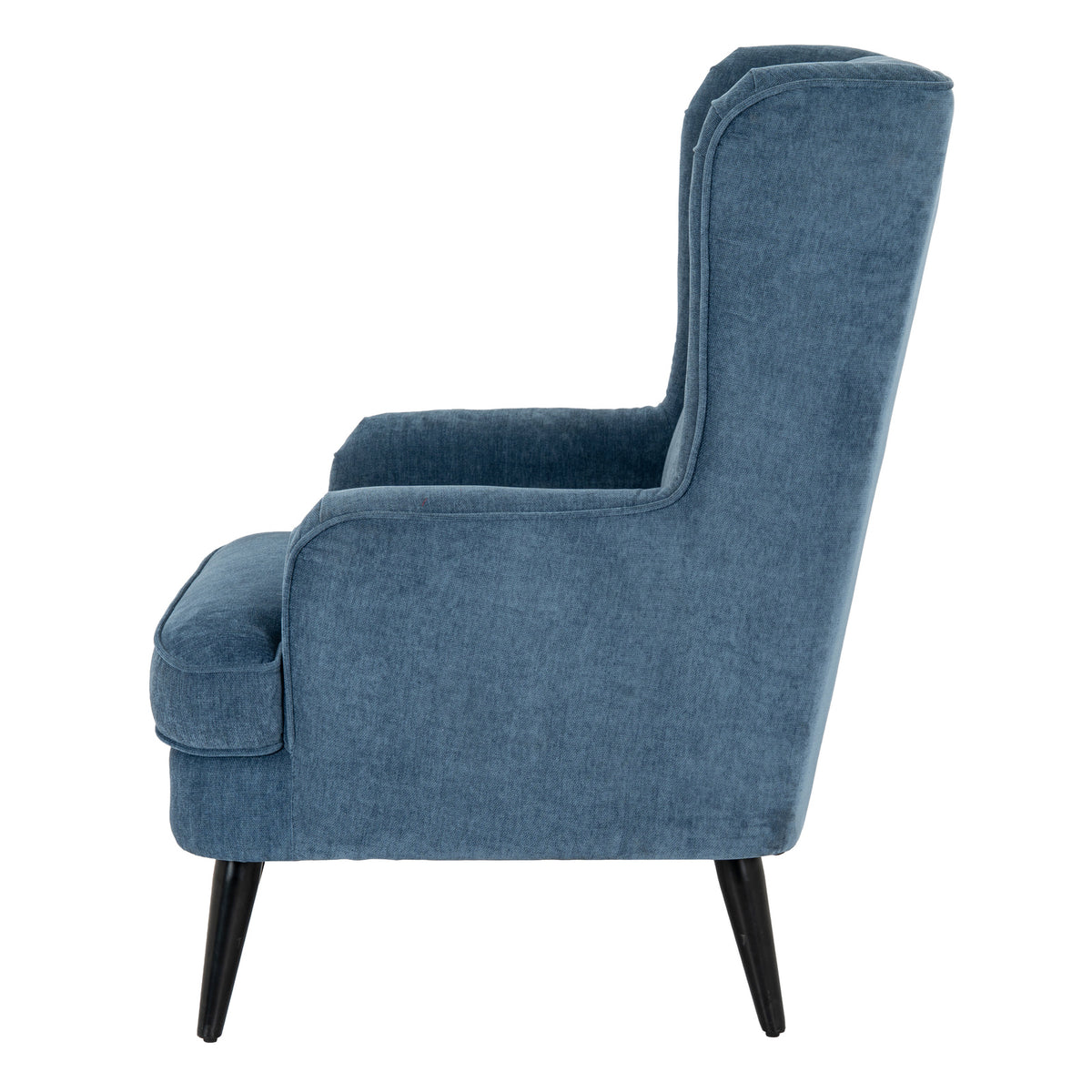 Side view of the blue armchair showing its tall sloping back, rolled wing, curved arm and black legs.