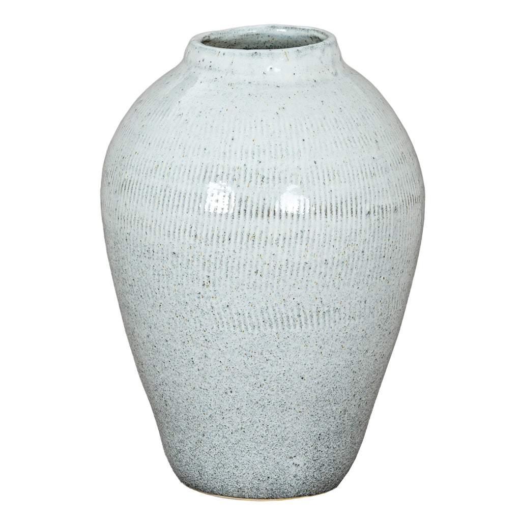 Pale blue-white speckled vase with a short open neck, rounded shoulders, an incised upper band and a tapered body against a white background.