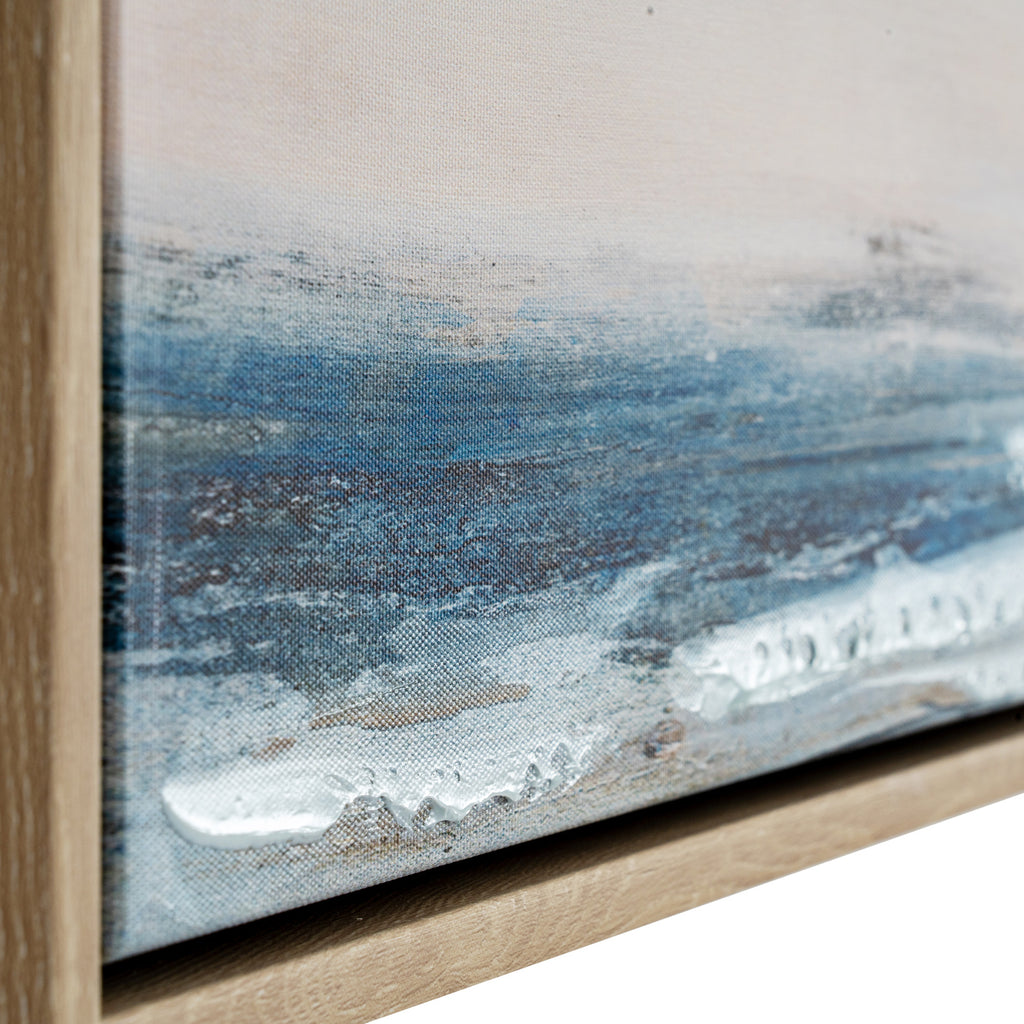 Angled close-up of the lower canvas, with visible weave beneath blue and grey marks and raised white paint near the frame.