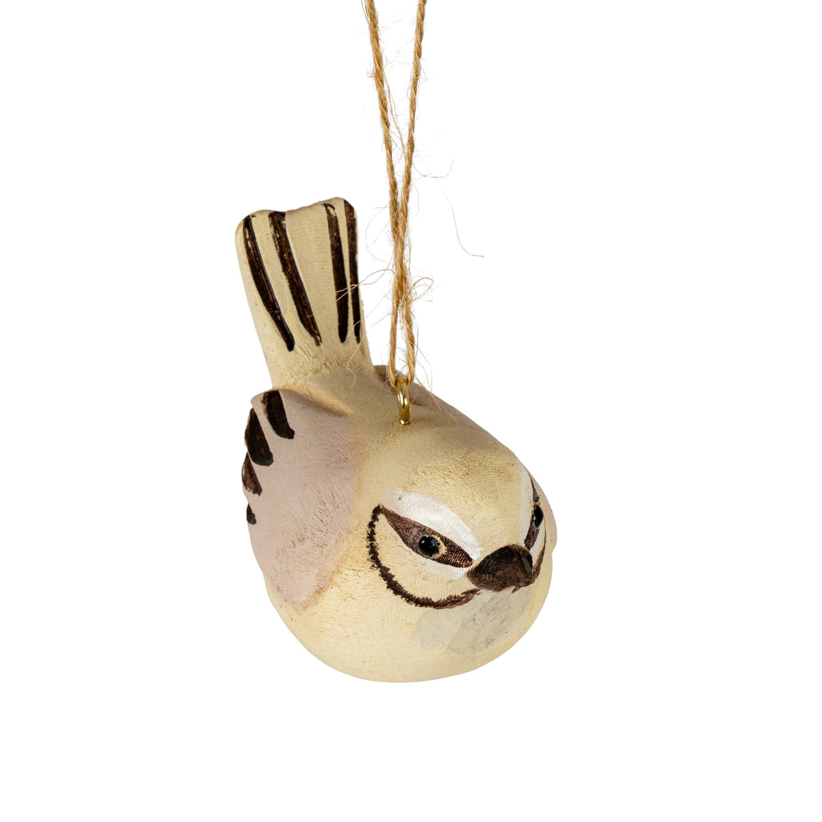 Angled close-up of the bird decoration showing its brown beak, glossy dark eyes, white and brown face markings and striped tail behind the hanging attachment.