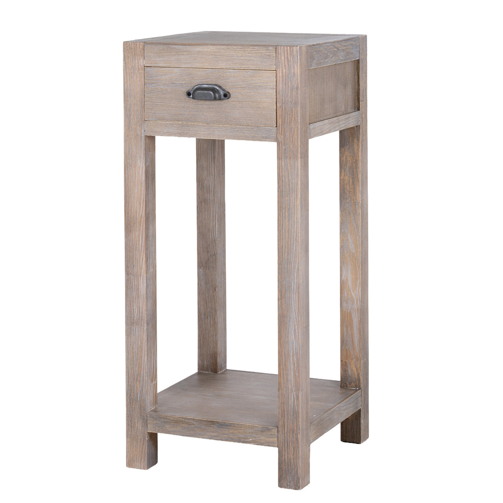 Three-quarter view of the pale-brown Border & Cup side table, showing its drawer, dark cup pull, straight legs and low shelf.