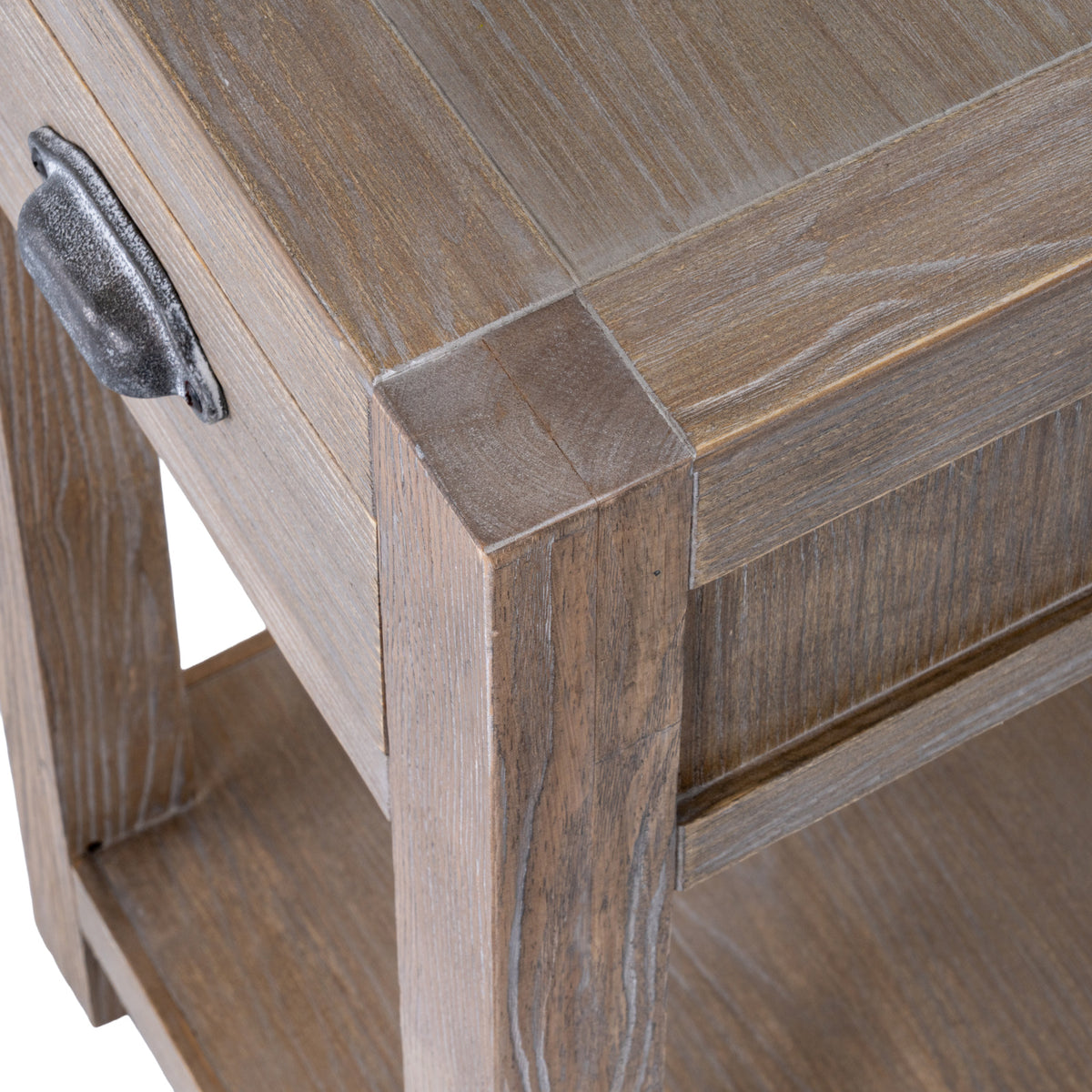 Detail of the table's top corner showing the flat border, white-highlighted grain and framed side panel.