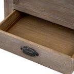 Lower drawer pulled open beneath the shelf, showing its empty interior and dark cup handle.