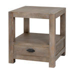 Front angled view of the pale side table showing its framed square top, open shelf and lower drawer with a dark cup pull.