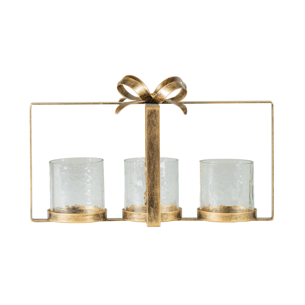 Front view of the antique-gold bow hurricane with three hammered-glass holders in an open rectangular frame.